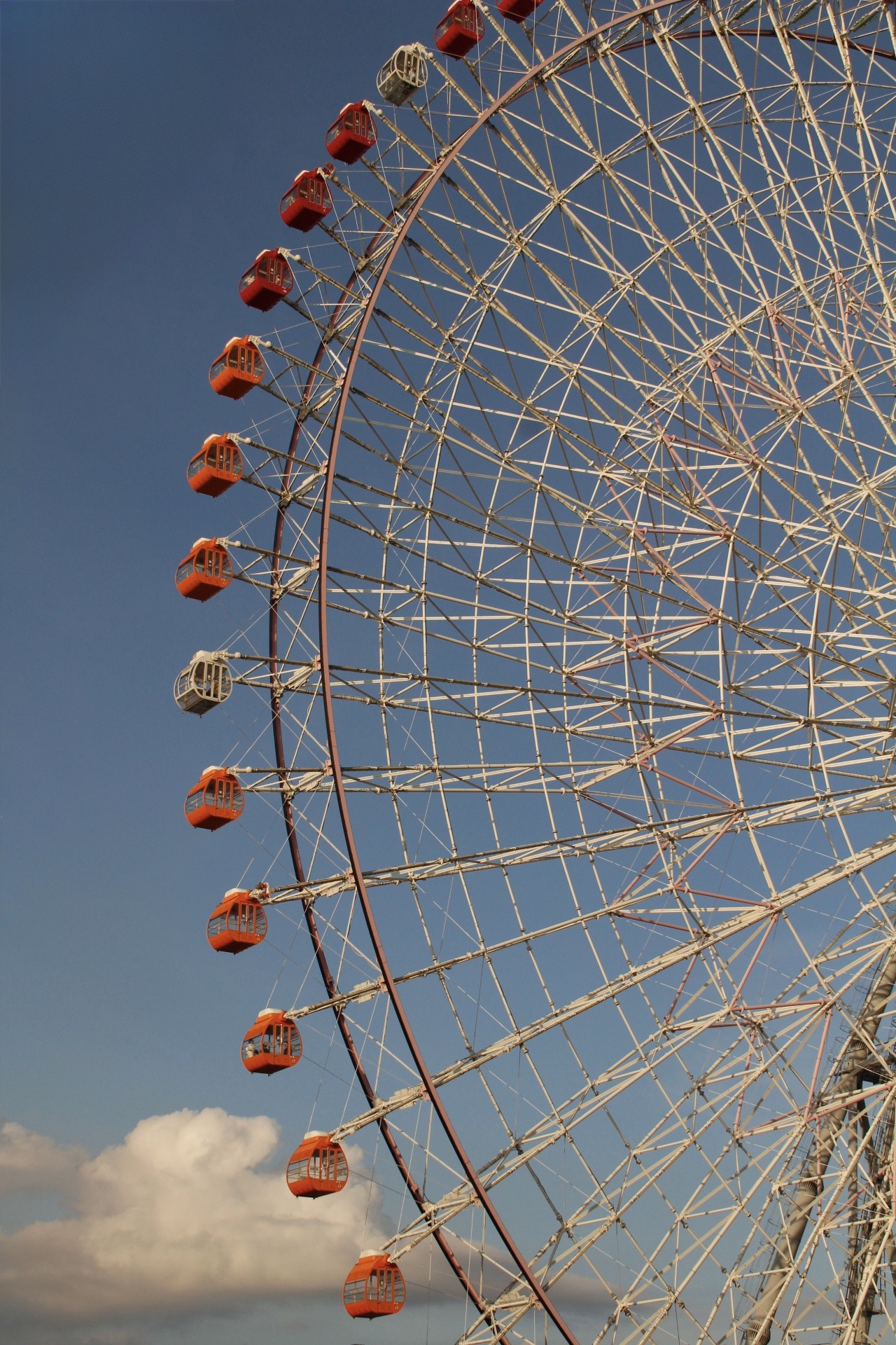 Ferris wheel against blue sky